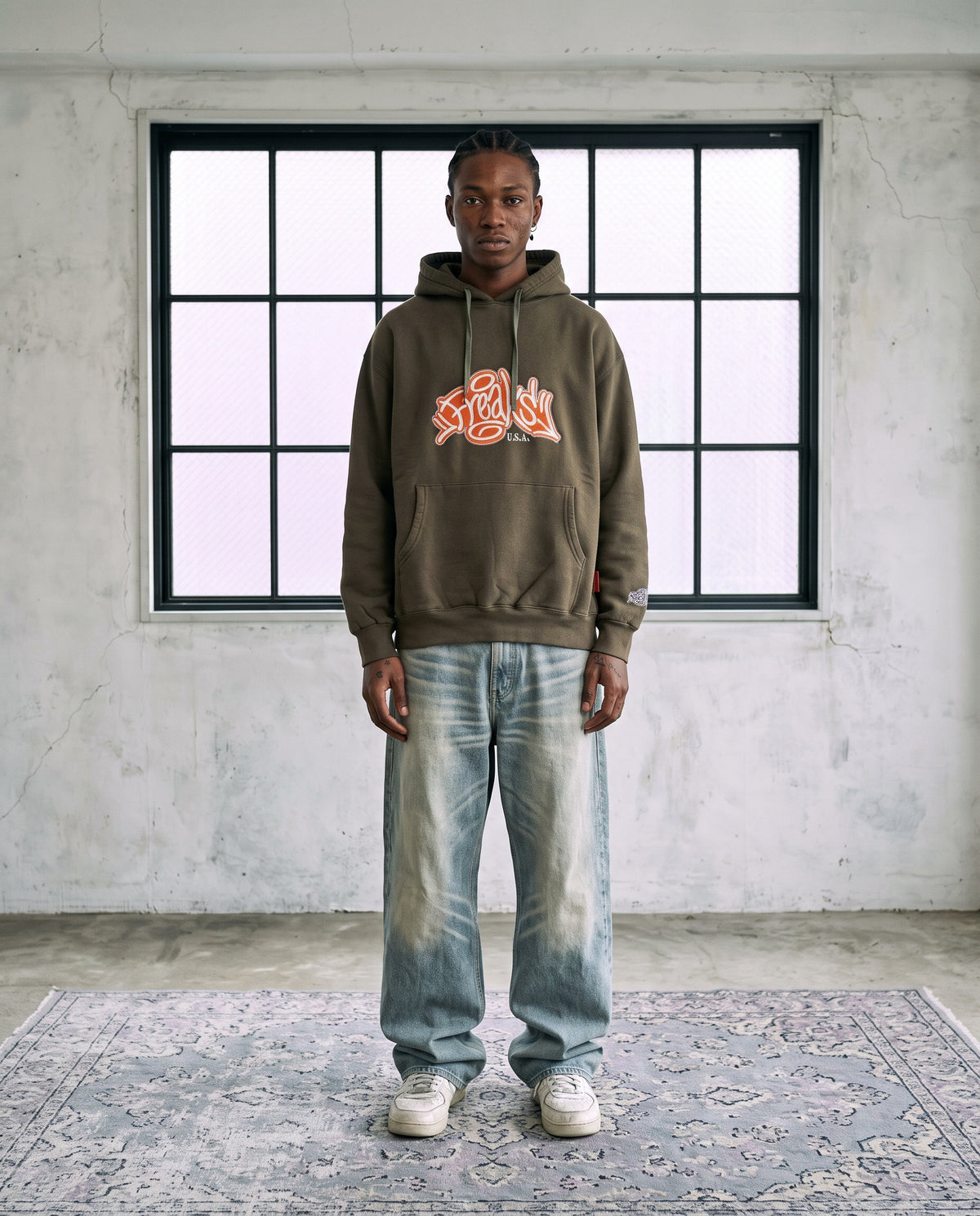 Model wearing Freaks USA Hoodie L