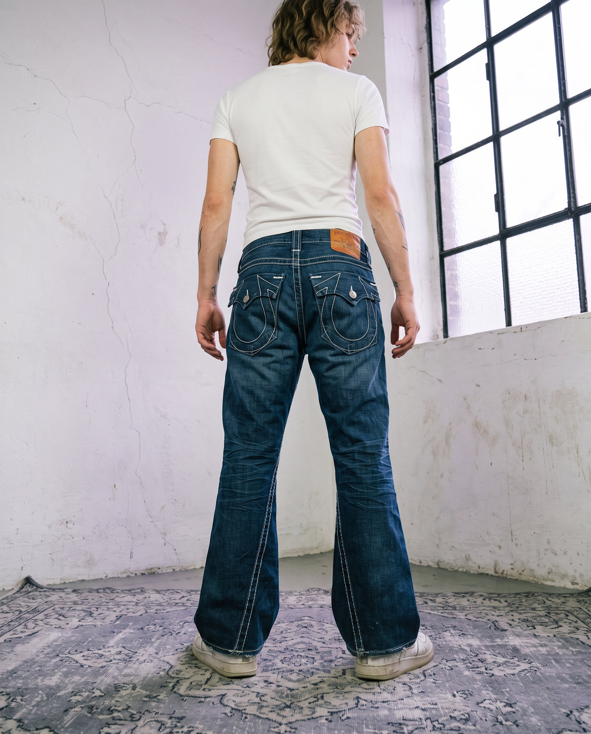 Model wearing True Religion Bootcut Flared Jeans M
