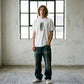 Model wearing Hook-Ups School Sucks T-shirt XL